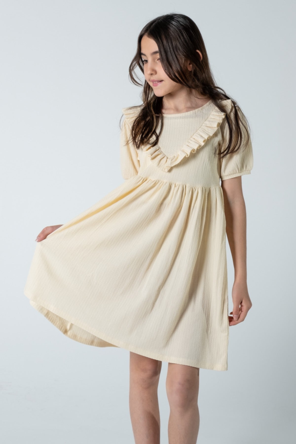 Fırfır Detaylı Bürümcük Kumaş Kız Çocuk Kısakol Elbise / Farklı Renk Seçenekleriyle - Krem